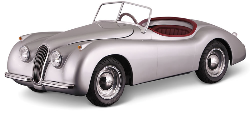 Illustration for article titled A Tiny Drivable Jaguar Replica Might Be the Perfect Car For Big City Commutes